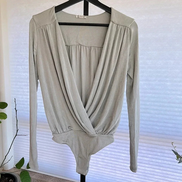 Free People Turnt Wrap Front Bodysuit Silver Metallic Small NWOT Contemporary - Picture 1 of 6